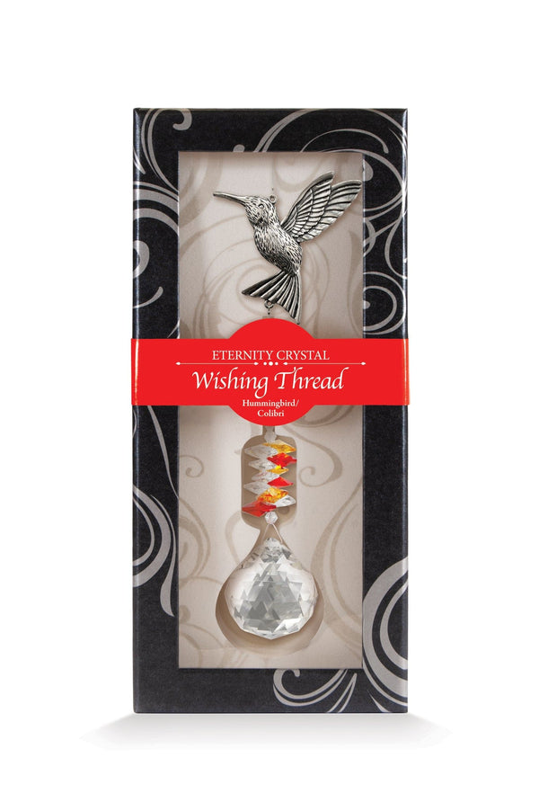 Fil à vœux Colibri Eternity Crystal présenté dans sa boîte illustrée avec son cristal facetté.