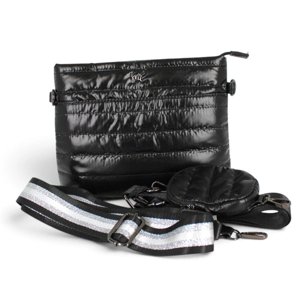 Sac bandoulière Maison Taïga en nylon noir matelassé avec sangle ajustable rayée argentée et petite pochette ronde