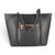 Sac fourre-tout noir Maison Taïga avec fermeture éclair dorée et anses structurées pour un usage quotidien élégant