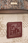 Sac à bandoulière Anekke Tulip – Poches avant et arrière – détail de la signature Anekke