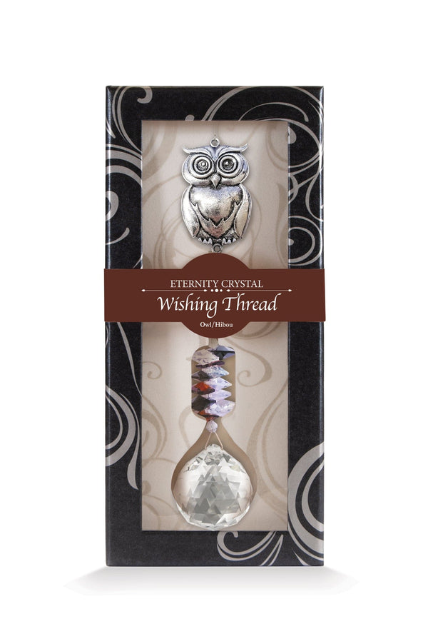Fil à vœux Hibou Eternity Crystal présenté dans sa boîte illustrée avec son cristal facetté.