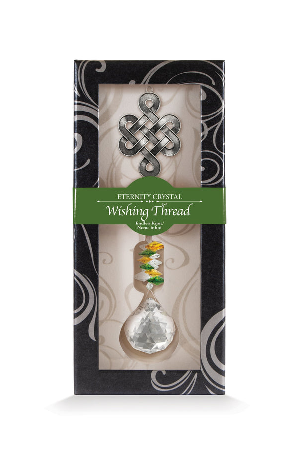 Fil à vœux Nœud infini Eternity Crystal présenté dans sa boîte illustrée avec son cristal facetté.