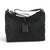 Sac à main épaule Maison Taïga en cuir noir avec texture tressée, doté d'une sangle ajustable et d'une étiquette.